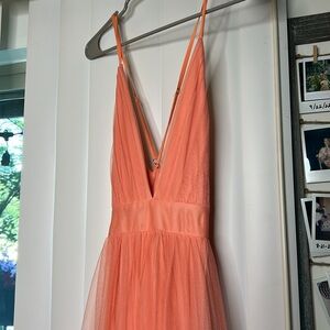 Woman’s Sleeveless formal flowy gown in Coral size small
